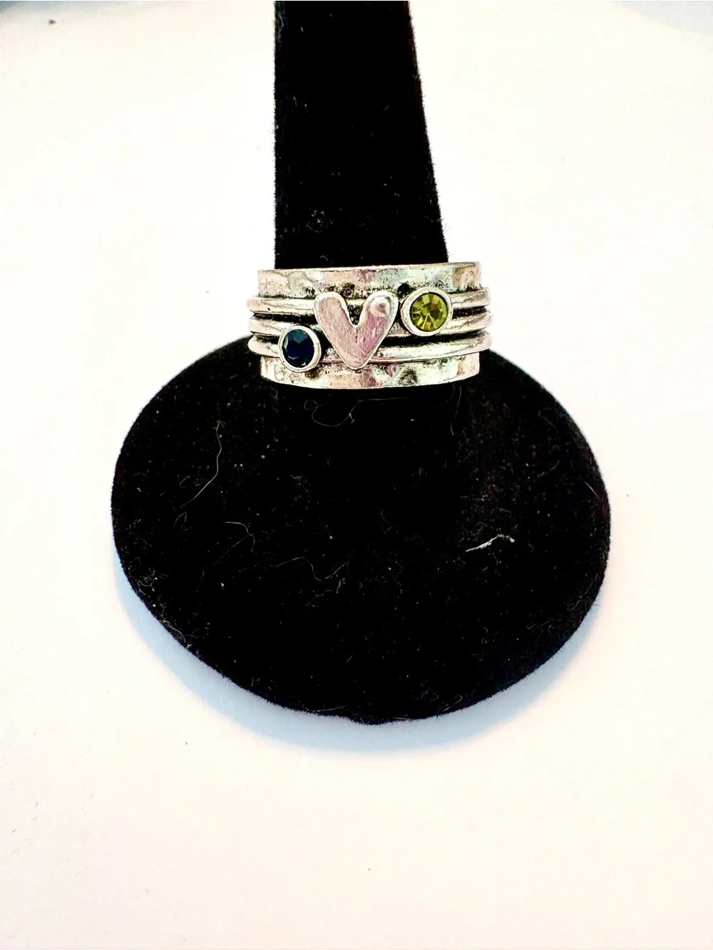 3 stationary bands, 925 marked, with Tanzanite and Peridot stone ring  size 6
